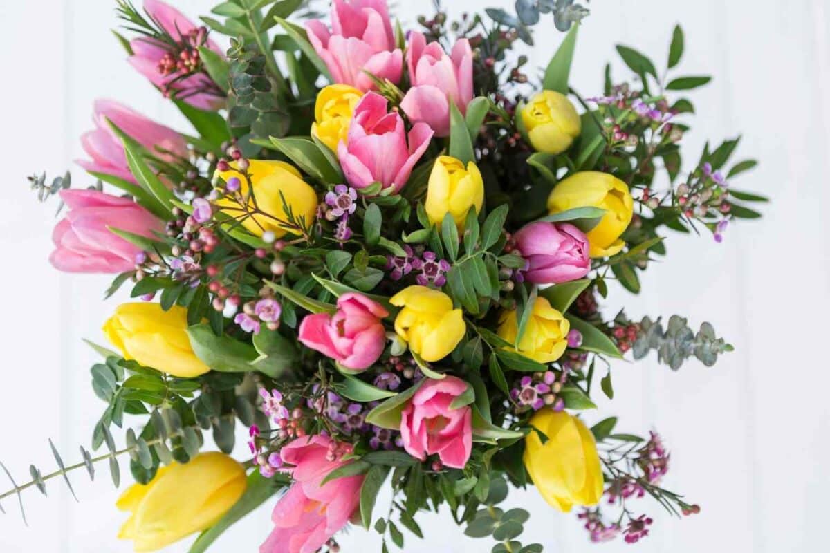 Calgary Florist | Boutique Color Combinations That Make Flowers Look Instantly Beautiful A colorful decorative bouquet with pink yellow tulips.