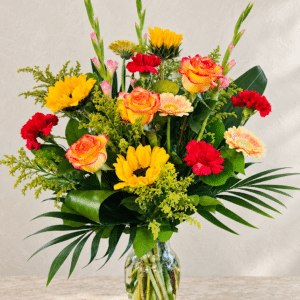 Sunlit Floral Arrangement on Stone 1.png